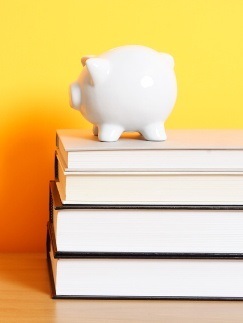 Piggy bank with books